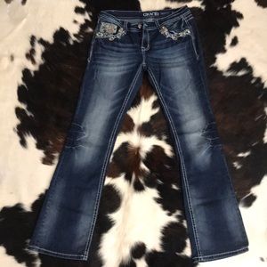 Boot cut embroidered jeans